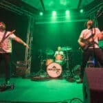 Photograph of a band dressed in Halloween Fancy dress for a Halloween club night
