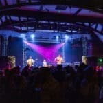 Photograph of a crowd of people dressed in Halloween Fancy dress for a Halloween club night