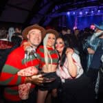 Photograph of a crowd of people dressed in Halloween Fancy dress for a Halloween club night
